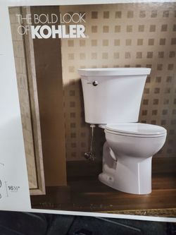 NEW Kohler soft close elongated toilet seat