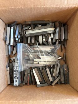 Large collection of lathe tool bits, high speed and carbide.