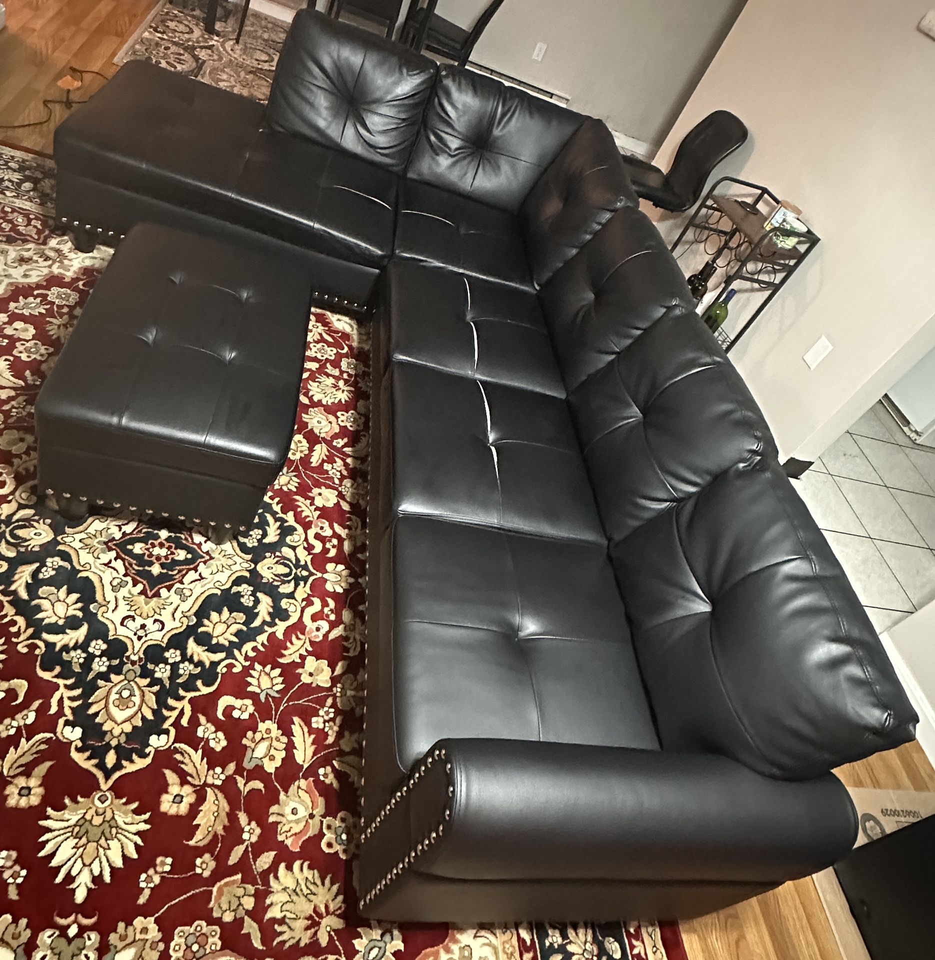 Row Faux Leather Sectional Sofa Couch with Storage Ottoman, Cup Holder in Black