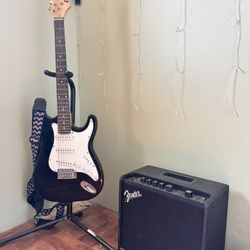Electric Guitar With Fender Amp 