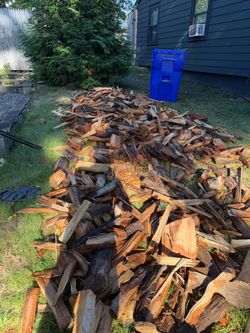 Slash/cut off wood for burning.