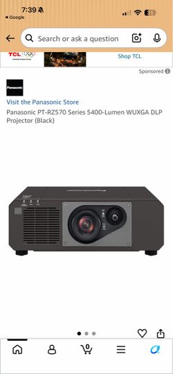 with projector screen. Panasonic PT-RZ570 DLP Projector Black. with projector screen.