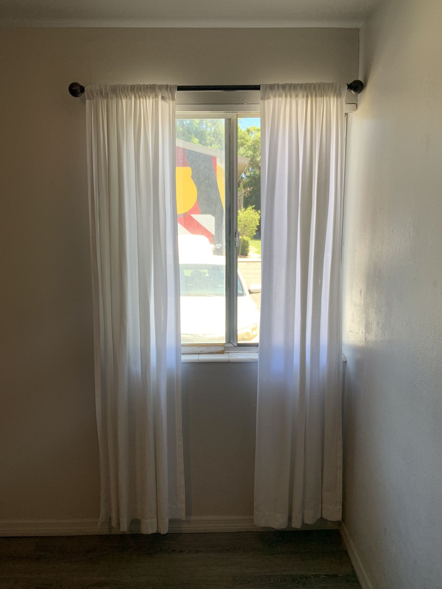 White curtain panels and bronze rod!