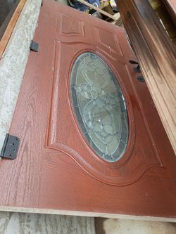 Exterior Entry Door with Oval Leaded Glass