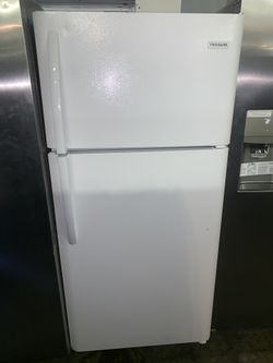 New Frigidaire scratch & dent top freezer refrigerator working perfectly with 4 months warranty