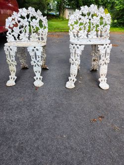 2 cast Iron Chairs  Selling Both For  375