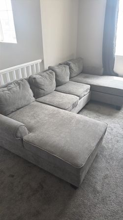 Grey sectional with storage