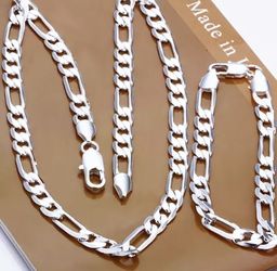 New 18 k white gold figaro chain and bracelet