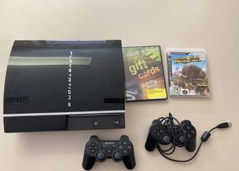 PS3 with Games and Controller
