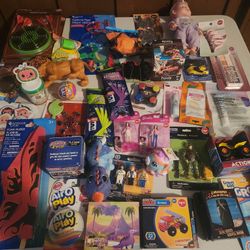 Bins of new items selling everything 2 for $1. More than what is shown