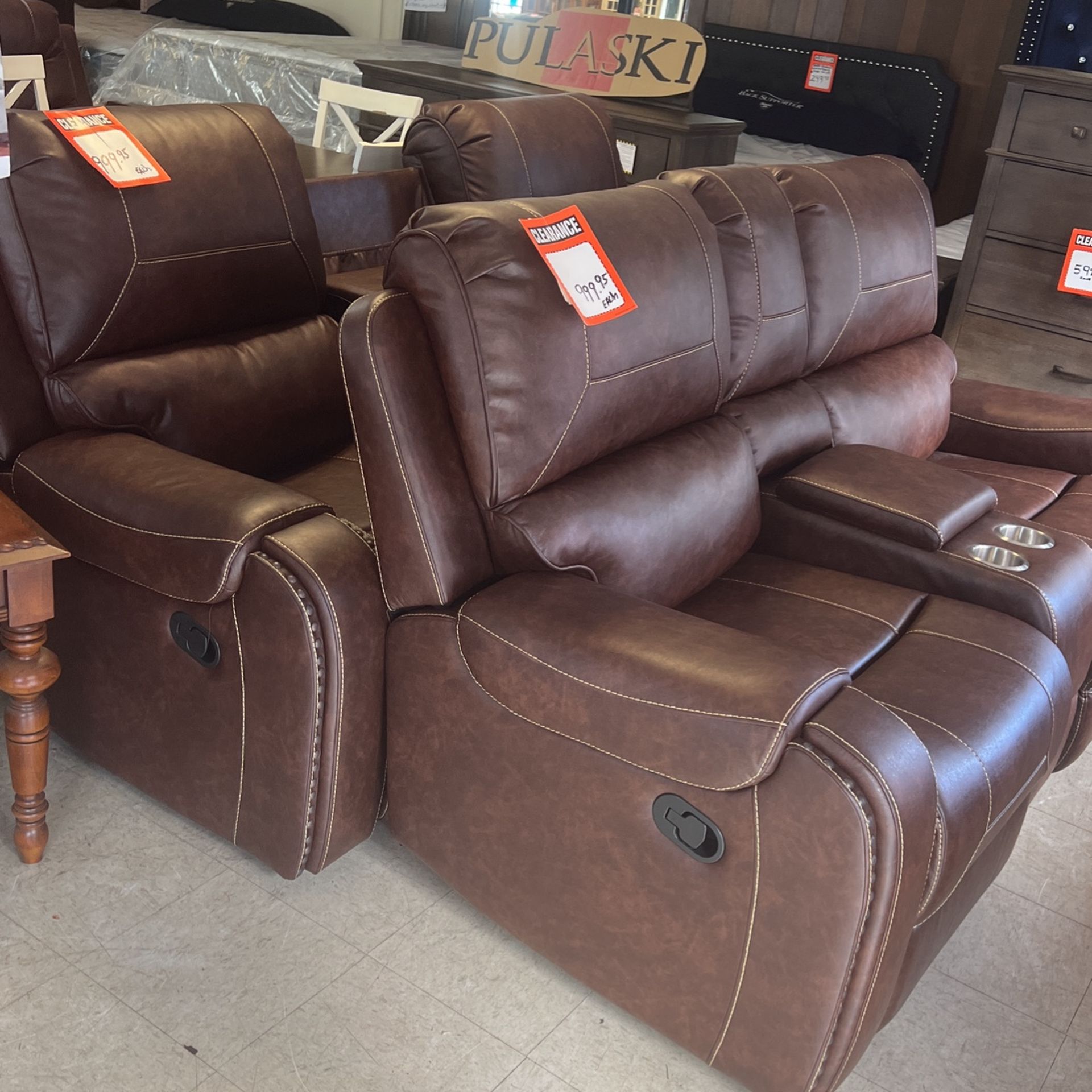 Reclining couch and vinyl sofa and loveseat both recline $2000 brand new