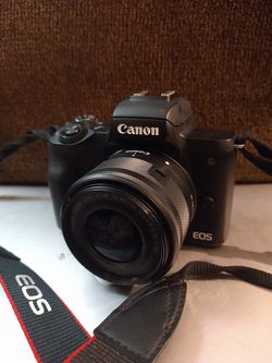 Canon EOS M50 mirrorless digital camera and rebel film camera package