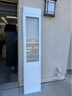 Dog door insert for sliding door