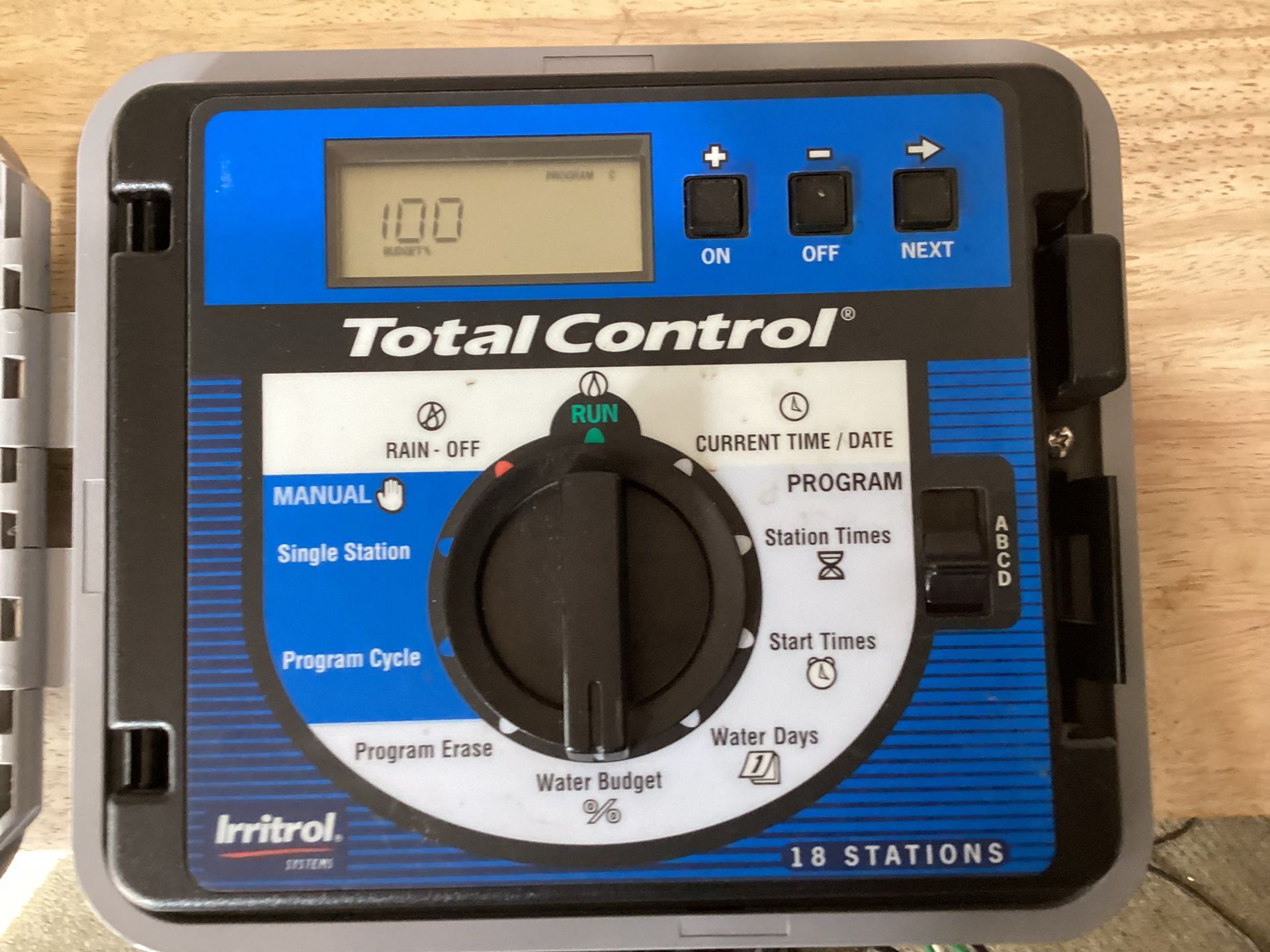 The device shown in the image is an Irritrol Total Control 18-station irrigation controller. This controller is designed for managing sprinkler system