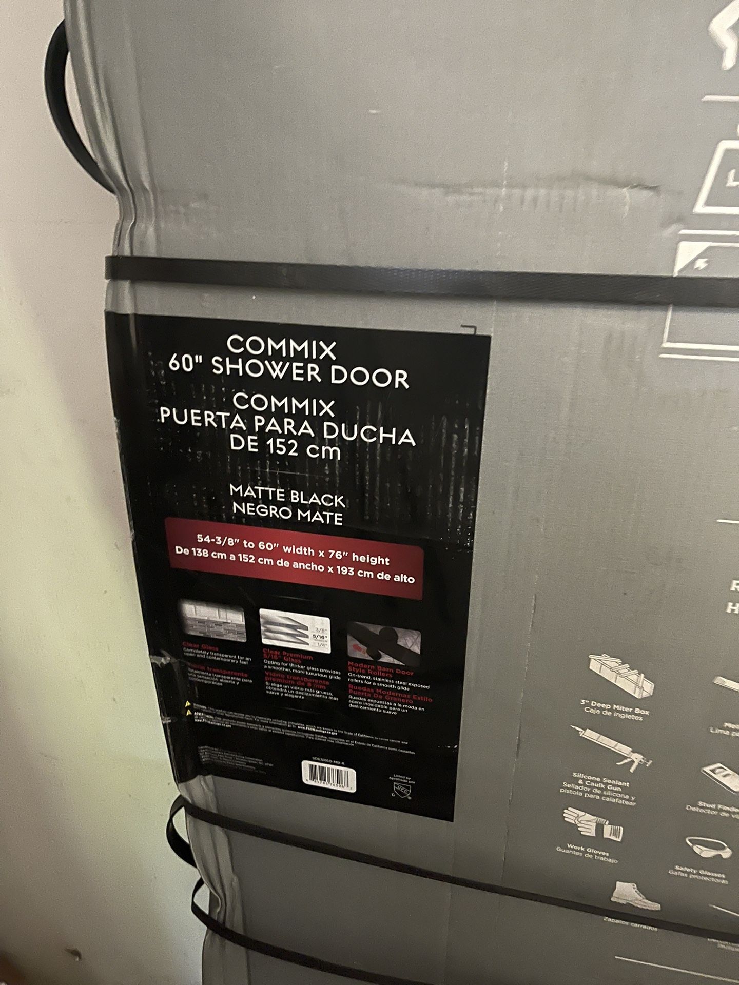 Delta Commix 60 × 76 in. Frameless Exposed Roller Sliding Shower Door in Matte Black with 5/16 in. (8mm) Tempered Clear Glass