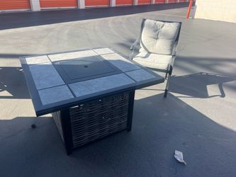Beautiful fire pit table and patio chairs