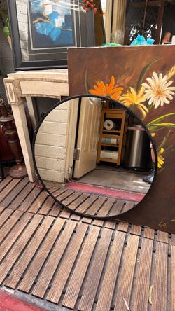 Round metal black mirror