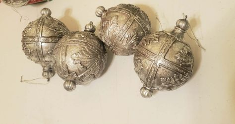2 sets of 4 silver Christmas ornaments