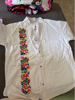 Playeras bordadas