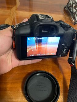 Canon R100 camera with rf-s 18-45mm f4.5-6.3 lens