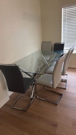 Glass table with 6 chairs