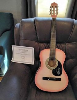 Wooden Guitar – Classic Craft with Rich Sound whose hear