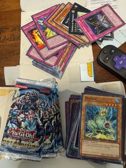 Yugioh cards abyss rising vintage booster packs + cards from the same packs.