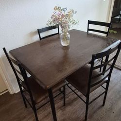 Dining table with 4 chairs – approximately 46” L x 31.5” W