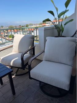 New swivel rocker lounge chairs with table