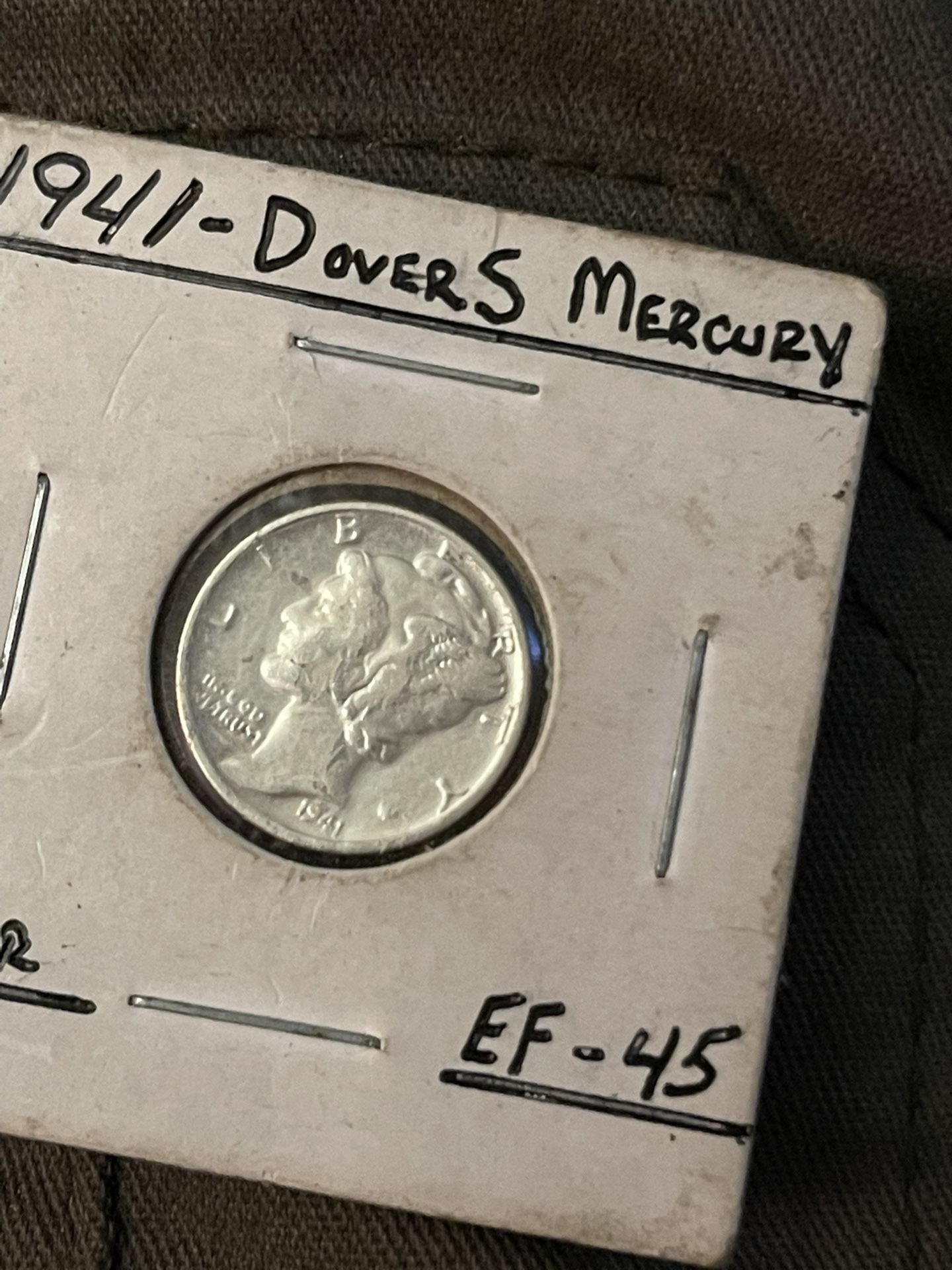 1942 s mercury dime with star error and also has solid bans on the columns on obverse side