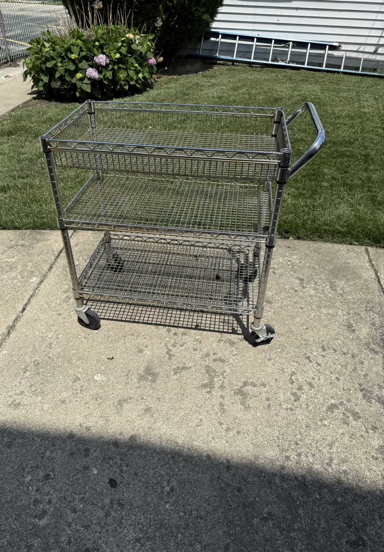 HEAVY DUTY INDUSTRIAL METAL CART IN GOOD CONDITION. IT MEASURES 18 DEEP,30 WIDE AND 33 HIGH. $75.00 OR BEST OFFER.