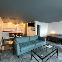 Modern glass and metal coffee table and end table