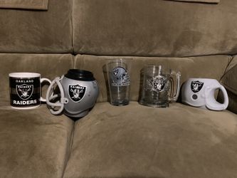 Vintage Oakland Raiders collectible coffee mugs