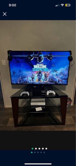 Large Flat Screen TV with TV Stand
