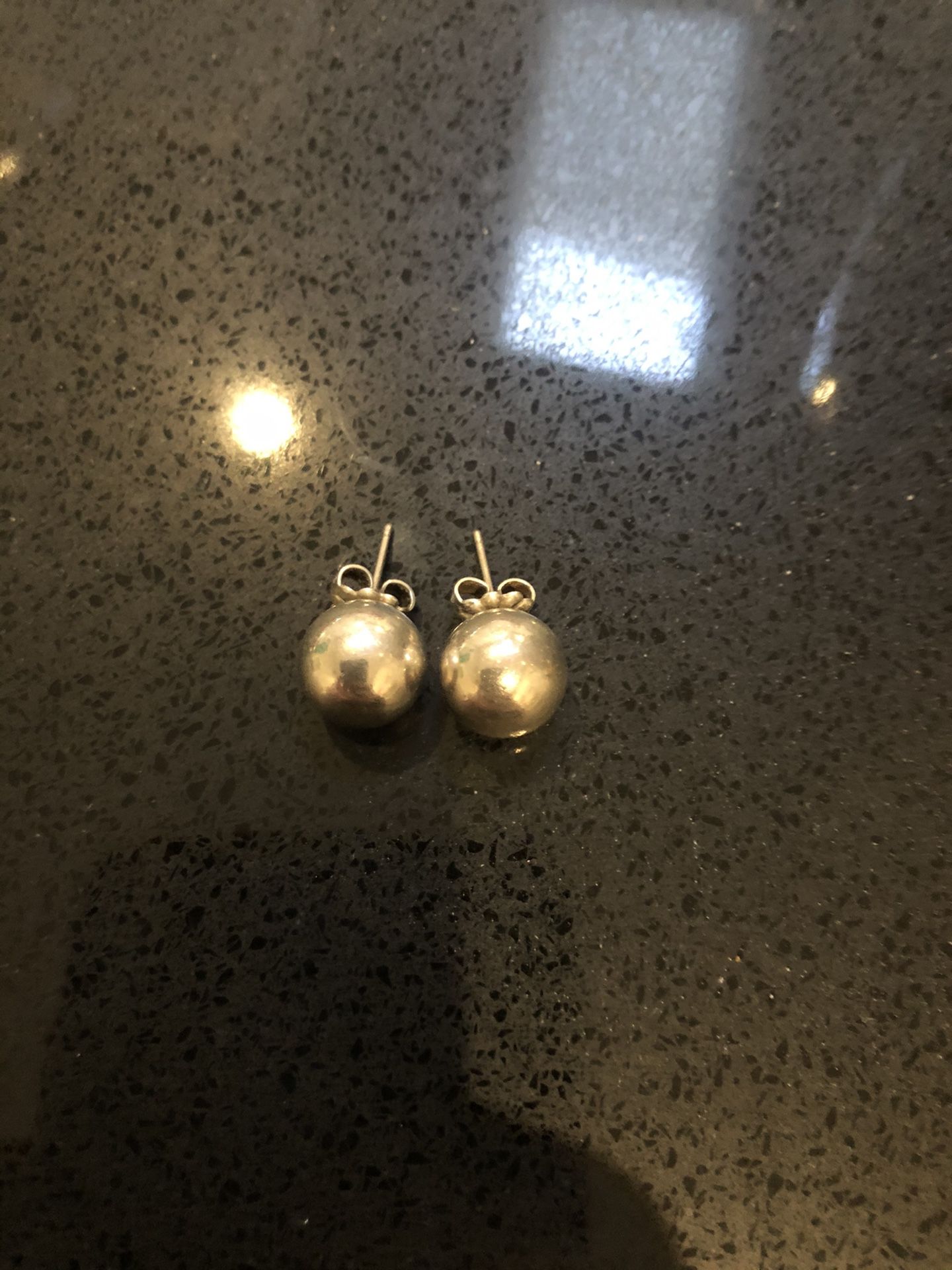 Tiffany’s silver ball earrings