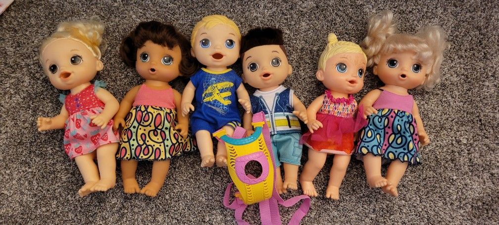 Five Baby Alive Dolls