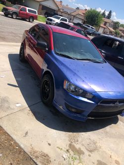 Mitsubishi lancer selling for parts or complete runs good
