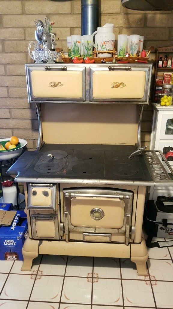 Copper clad antique wood burning cook stove