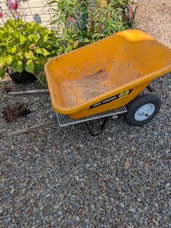 Dual wheel wheelbarrow