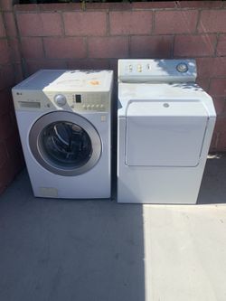 Maytag Atlantis clothes dryer and LG Front-Load Washing Machine.