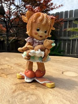 1994 Enesco "No Strings Attached" figurine.