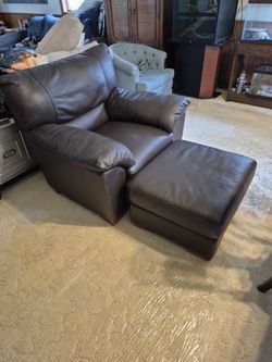 Leather armchair with ottoman