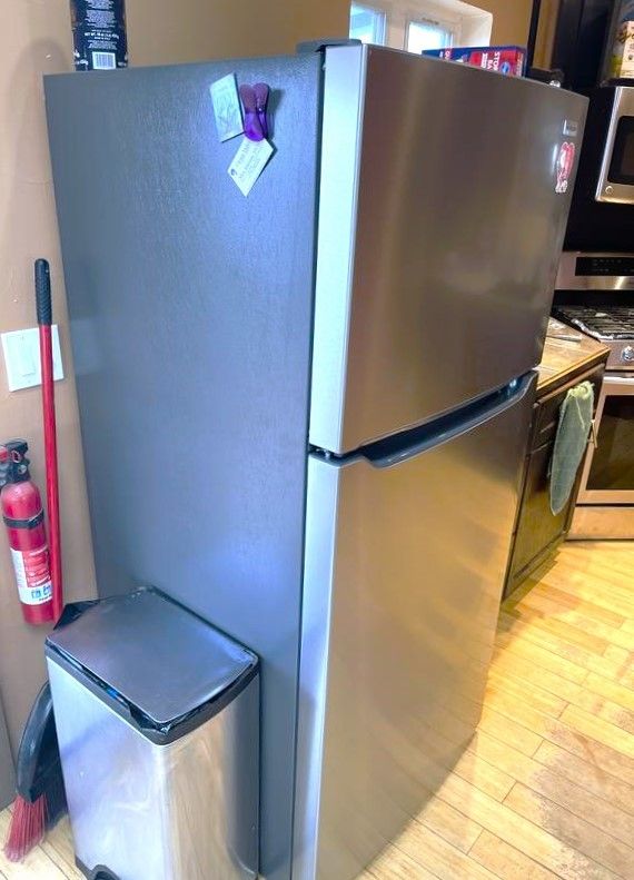 Amana Stainless Refrigerator with Top Freezer