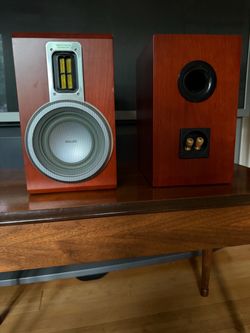 A pair of solid wood Hi-Fi speakers