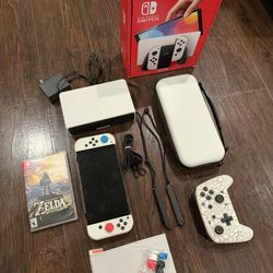 nintendo switch oled bundle with games