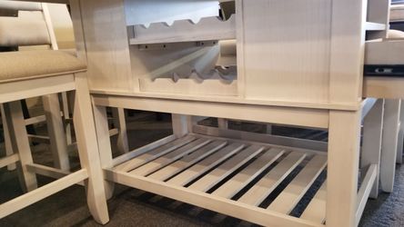 Brand new counter high dining set with wine rack