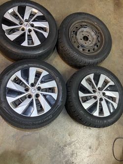 2010 Nissan wheels all good one bent