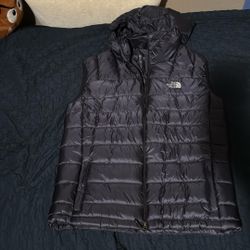 men’s North face hooded vest size L