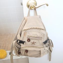 Back Pack, Nice Material, Beautiful, Nice Condition.