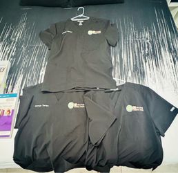 Massage therapy uniforms & books